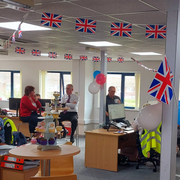 Hoval UK staff enjoying cakes for the Platinum Jubilee